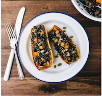 Stuffed Delicata Squash with Wild Rice, Brown Butter, and Sage